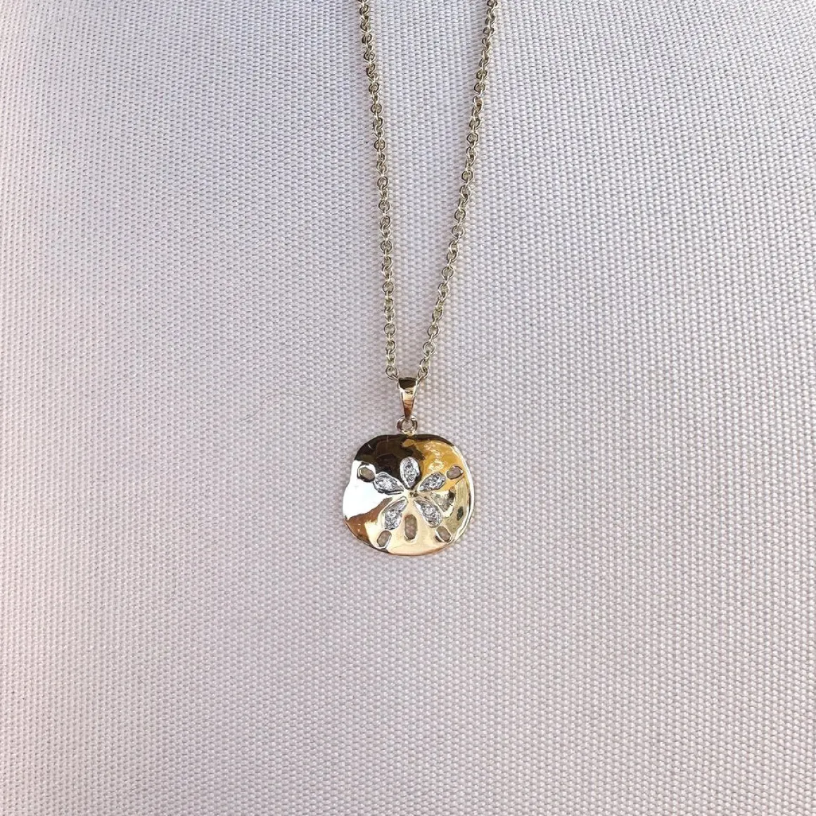 Radiant Sand Dollar Pendant Necklace